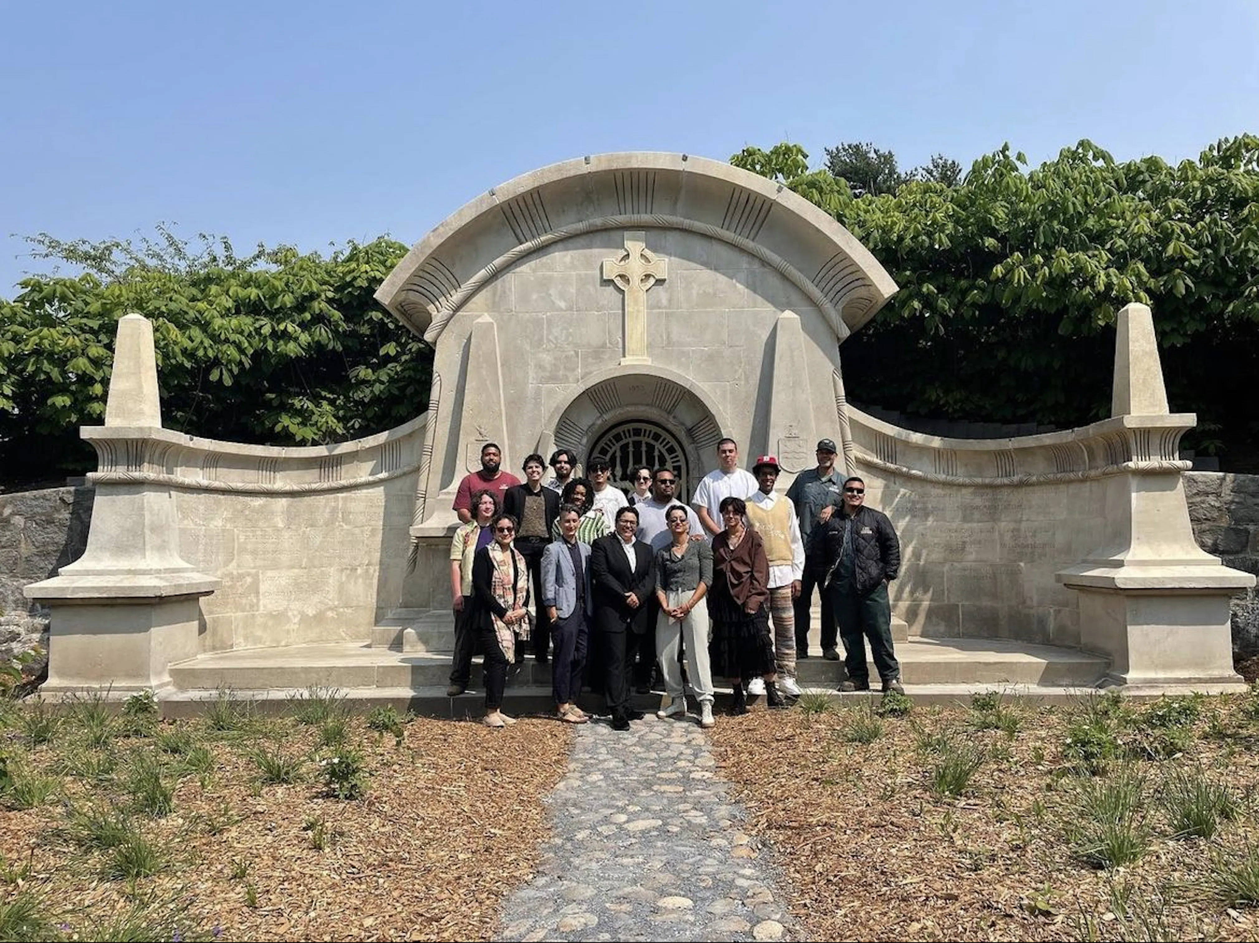 Green Wood Cemetery B2CC graduation day featuring all 2023 interns in front of restored Delafield Vault