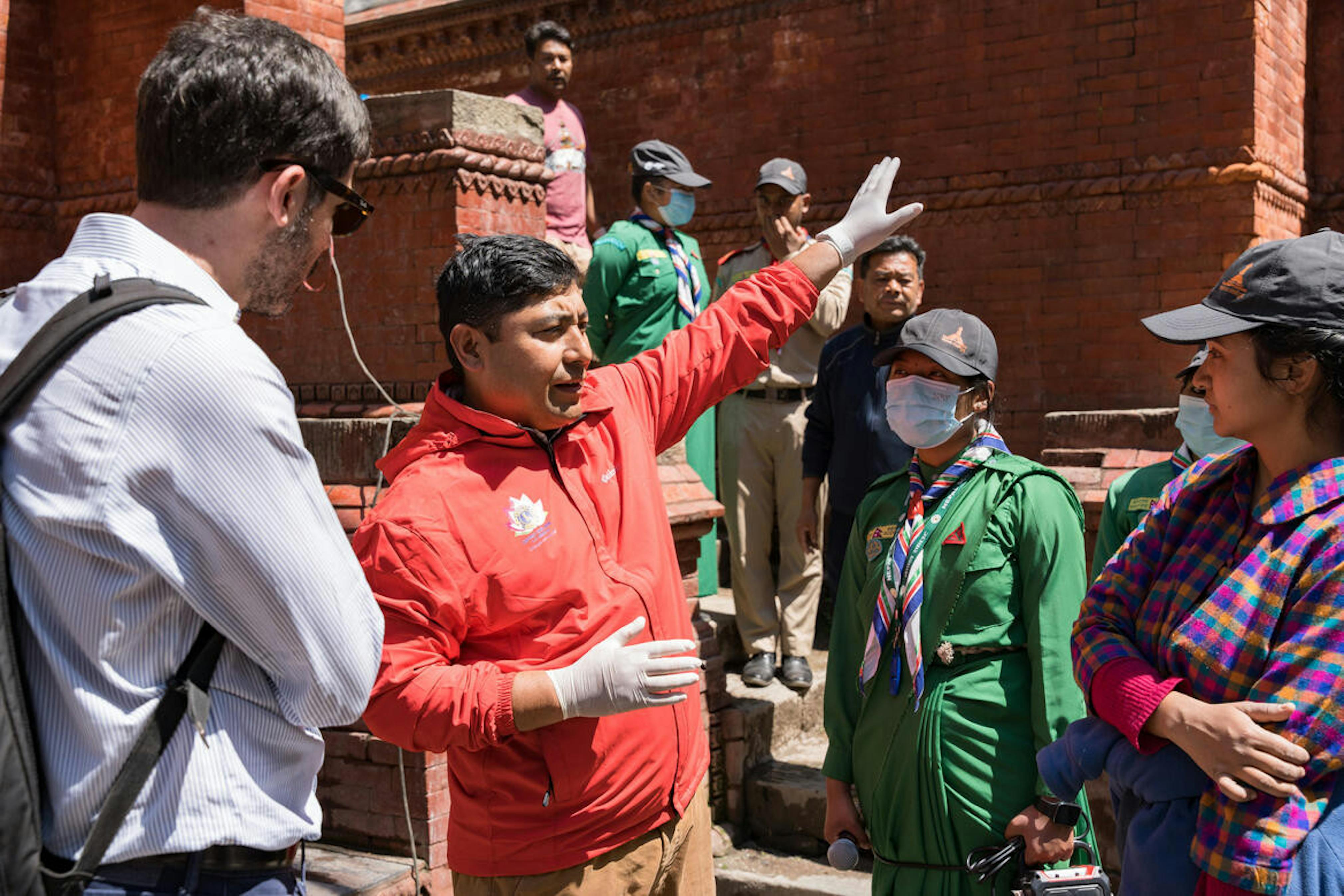 Watch Day participants learn about the hitis during a guided tour.