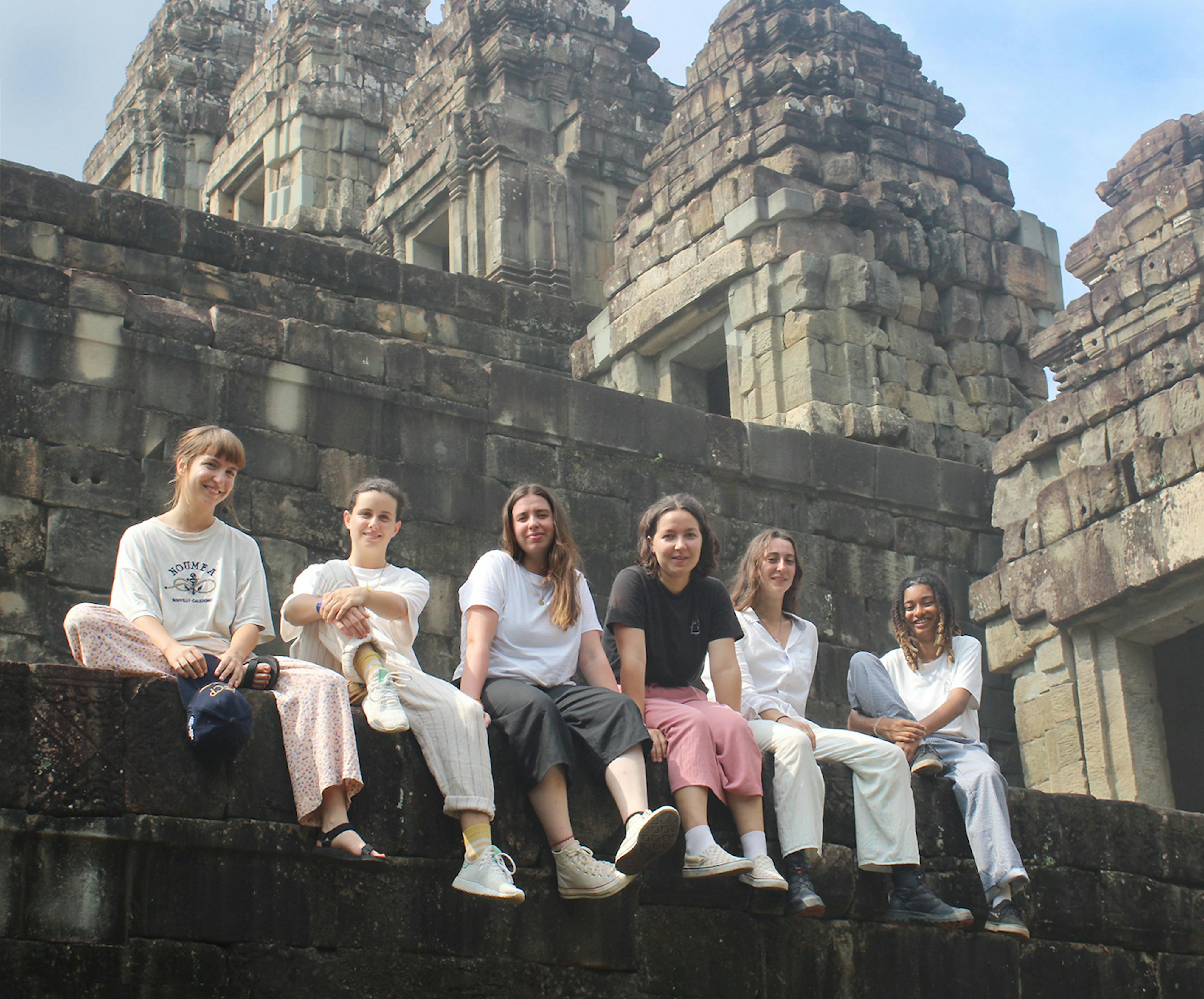 WMF staff member Som Sokea and Pleine Culture team at the Northeast corner of Phnom Bakheng, March 2022.