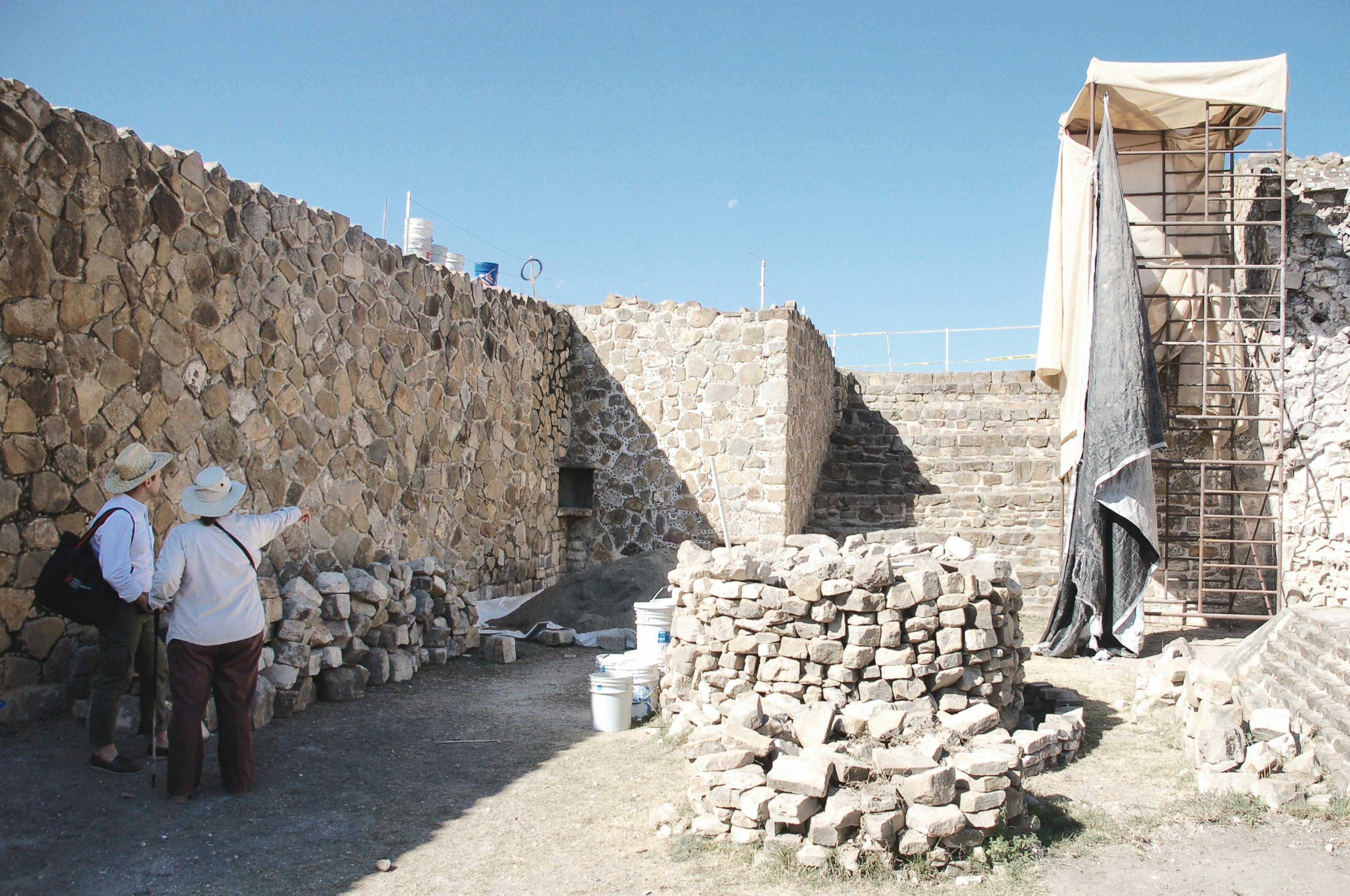 View of the ball court at Monte Albán, where conservation work is advancing . Left wall was recently reconstructed and right wall, scaffolded, showing work in progress. 